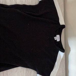 black sweater with white stripe sleeve